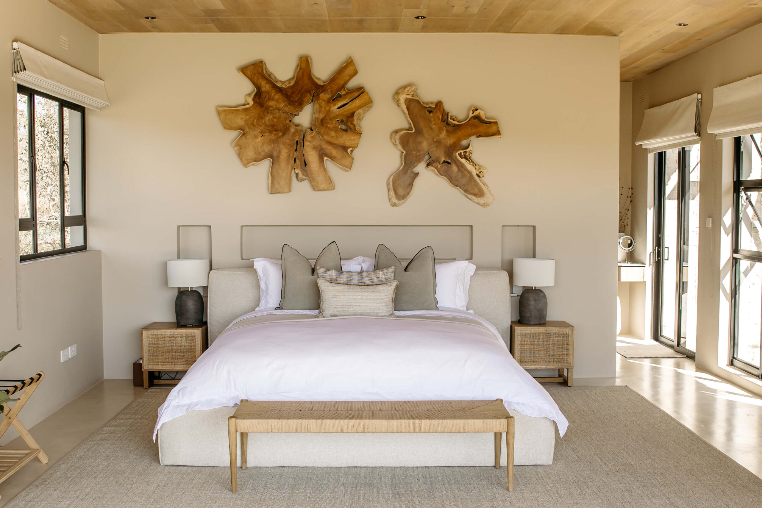 Blackout blinds. Air-conditioned stillness. Panoramic bush views.